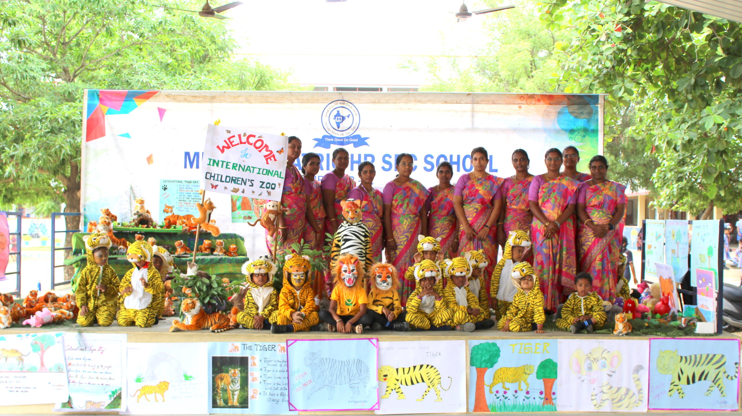 Happy kindergarten kids participating in classroom activities at Murugu Matric School