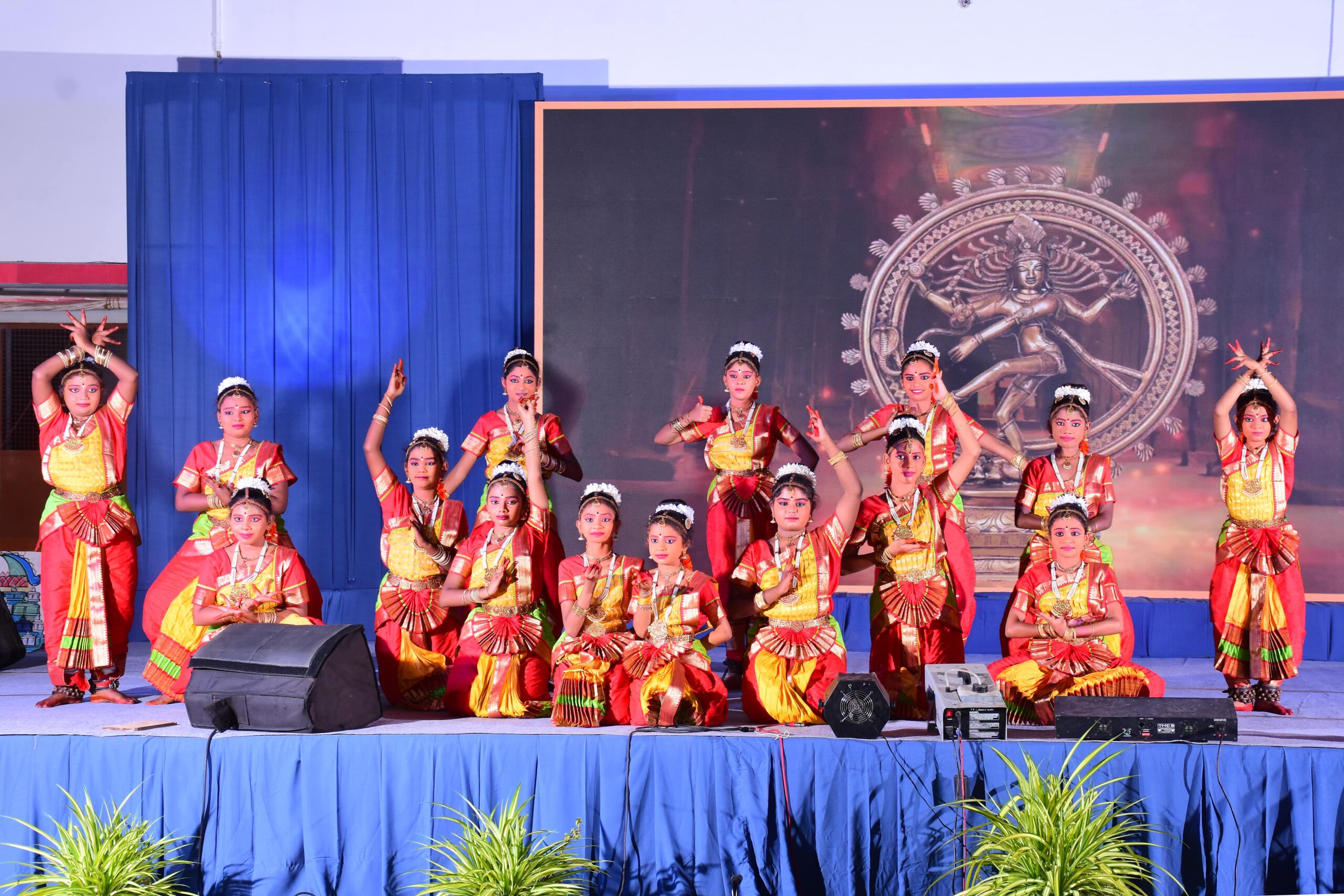 Student performing classical Bharatanatyam dance at Murugu Matric Hr Sec School Tirupur annual day